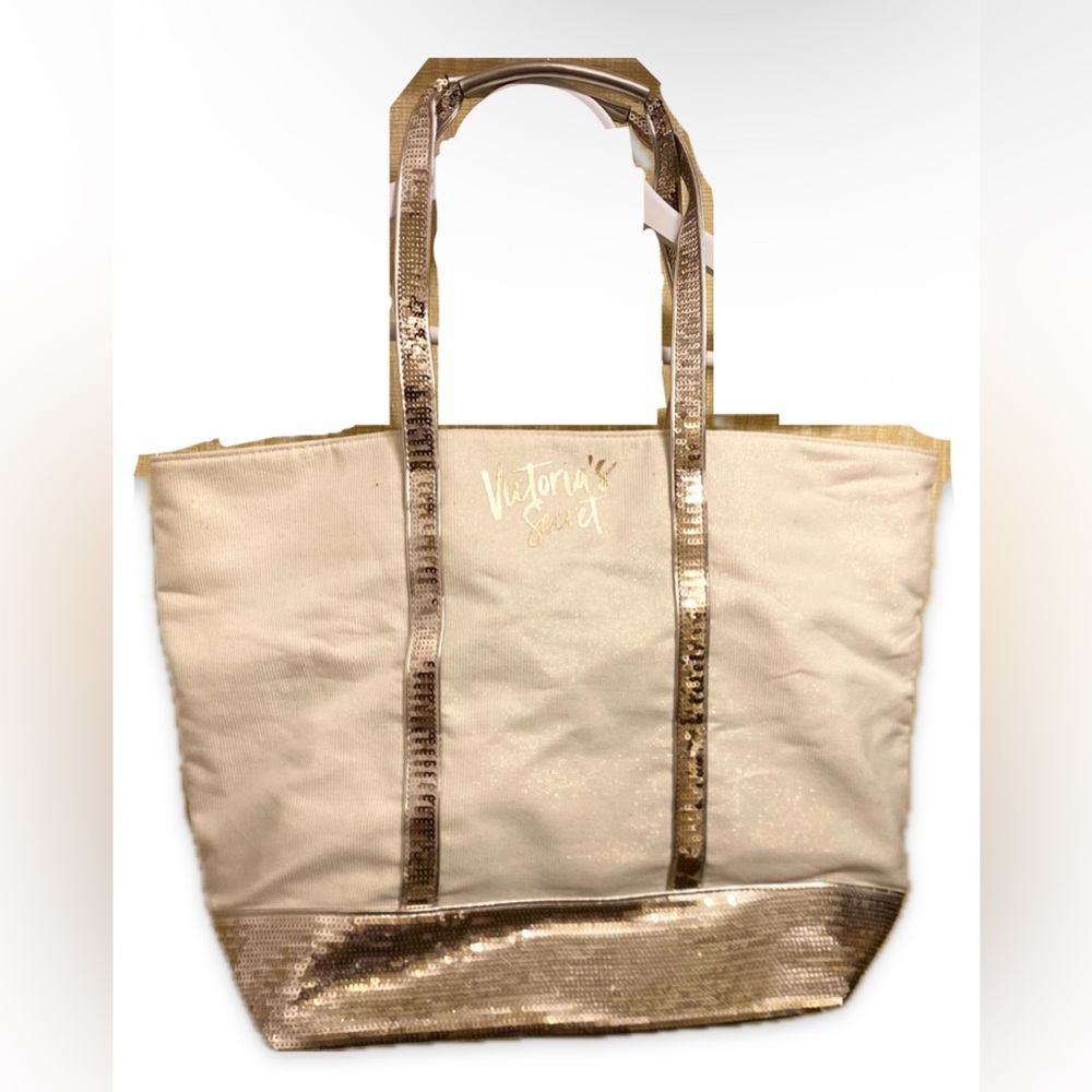 A Shimmery GOLD VICTORIA SECRET TOTE.
